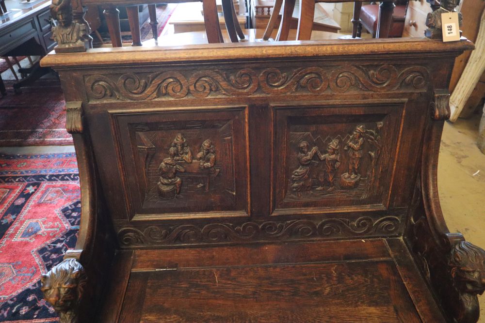 A late 19th century French carved box seat settle, width 100cm, depth 45cm, height 116cm